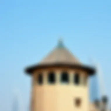 Traditional Wind Tower in Dubai A traditional wind tower showcasing its unique architectural features against the Dubai skyline.