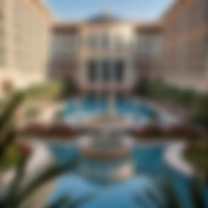 A picturesque view of the resort's pool area surrounded by lush landscaping